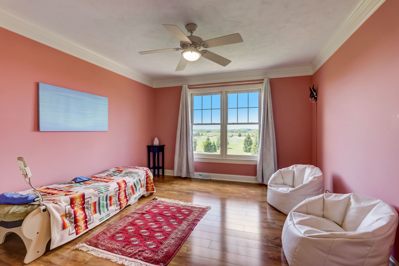 3462 Wild Prairie Lane Geneva, IL 60134 - Photo 27 of 59 a bedroom with a bed couch and window