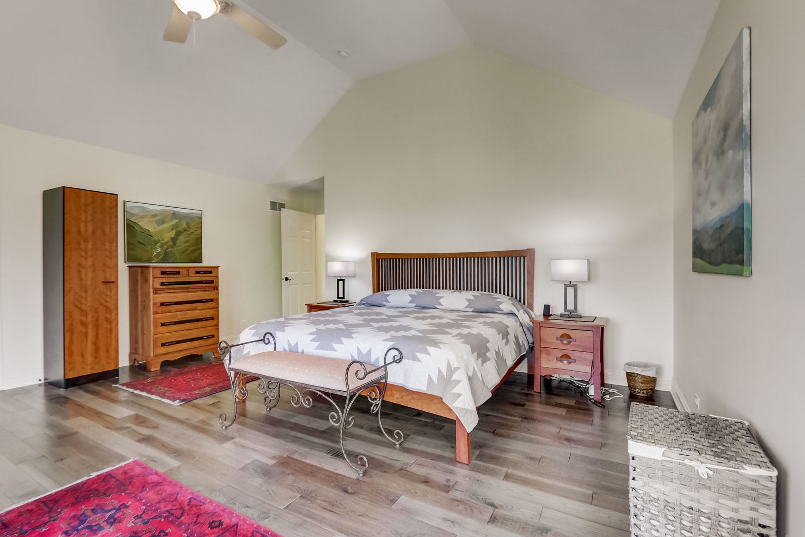 3462 Wild Prairie Lane Geneva, IL 60134 - Photo 35 of 59 a bedroom with a bed and a chandelier