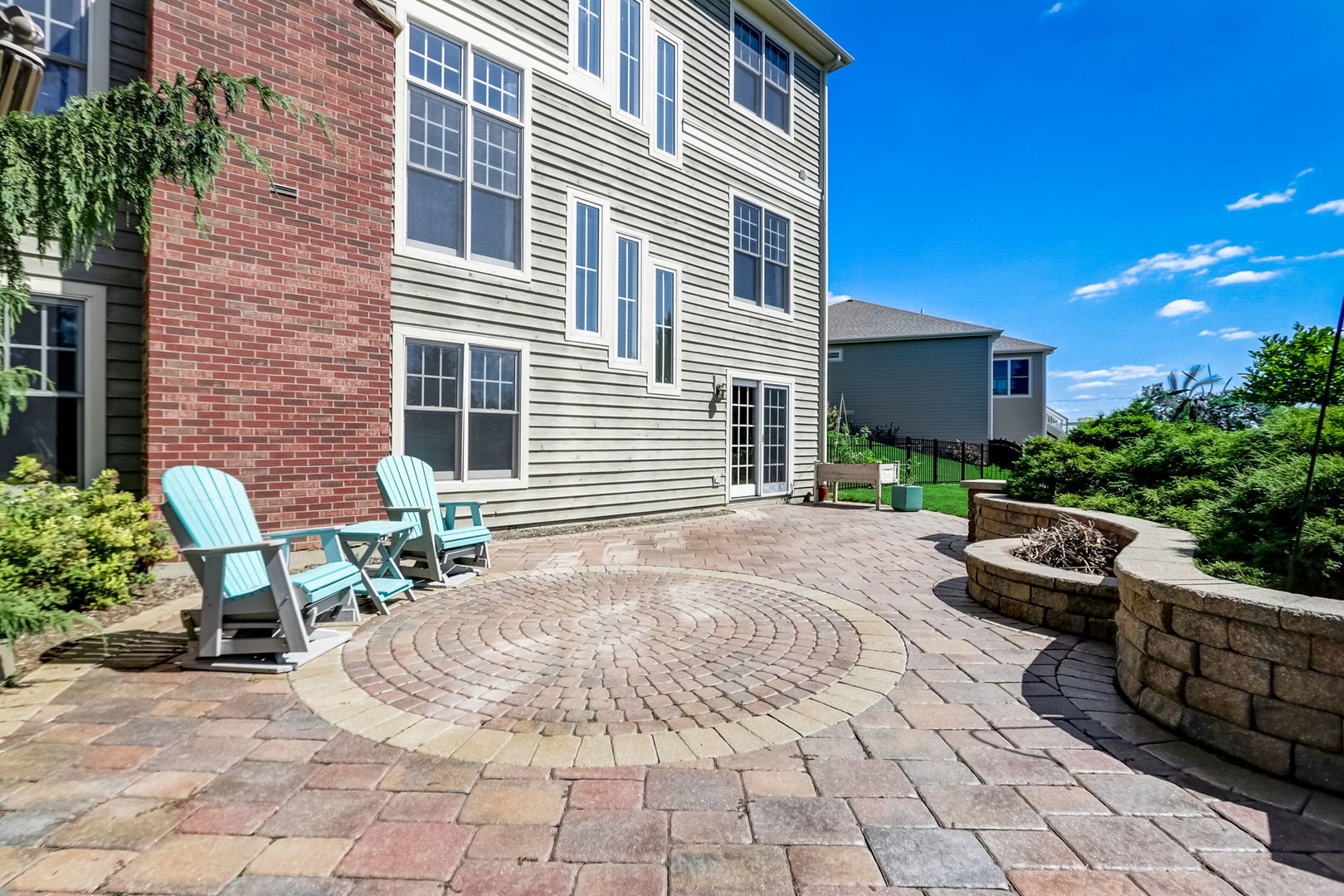 3462 Wild Prairie Lane Geneva, IL 60134 - Photo 42 of 59 a backyard of a house with seating space