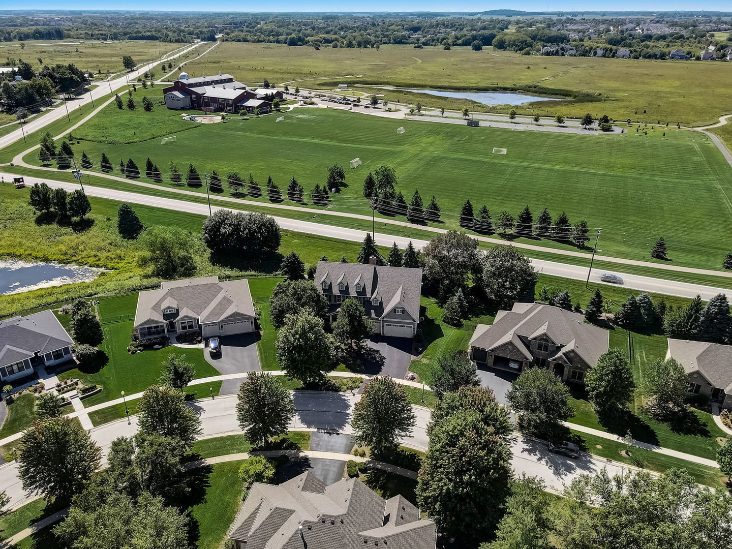 3462 Wild Prairie Lane Geneva, IL 60134 - Photo 50 of 59 an aerial view of river residential houses with outdoor space and swimming pool