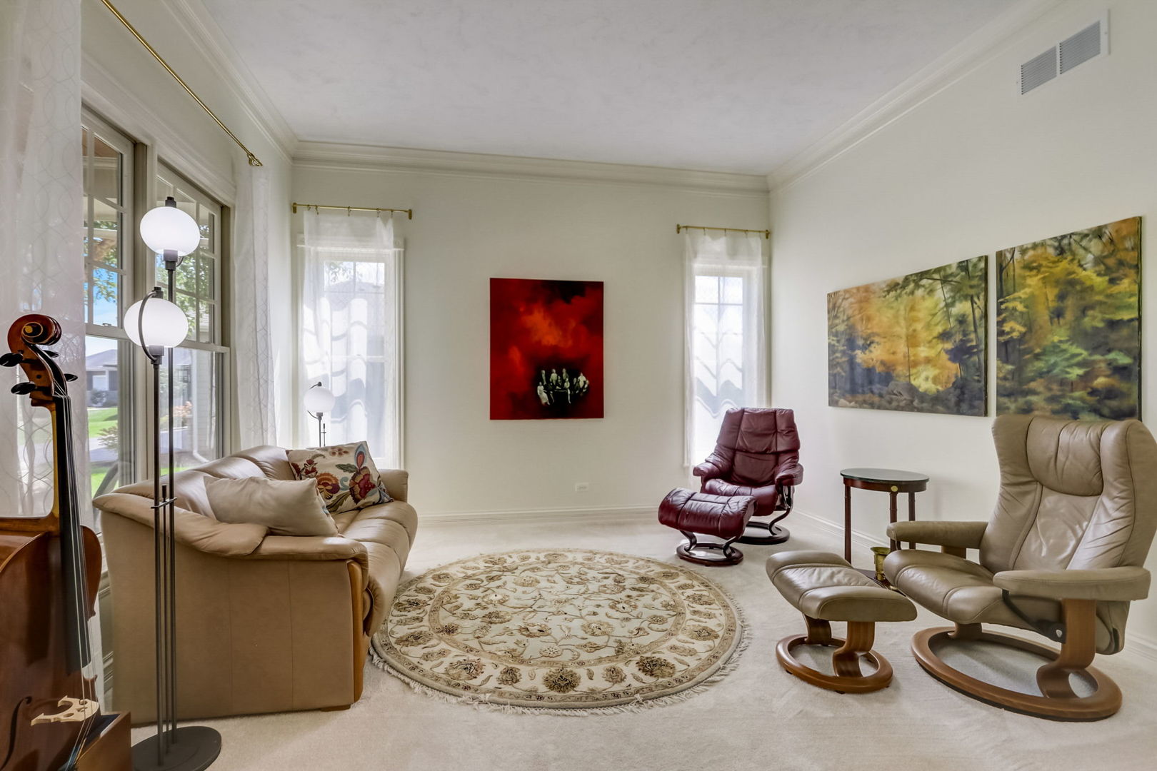 3462 Wild Prairie Lane Geneva, IL 60134 - Photo 5 of 59 a living room with furniture gym equipment and a large window