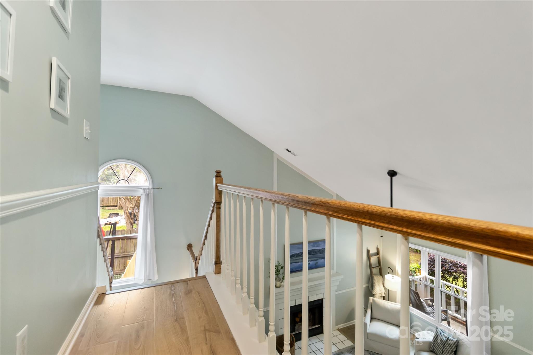 3329 Fortis Lane Matthews, NC 28105 - Photo 29 of 47 a view of a hallway with windows and stairs