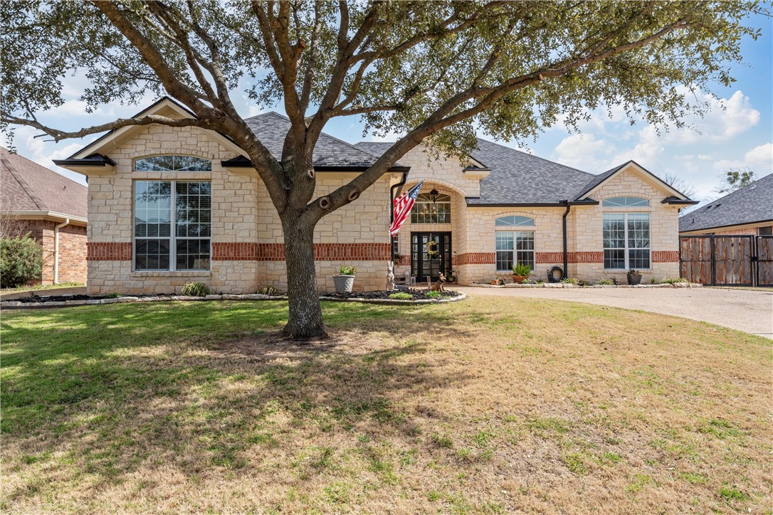 10513 T Bury Lane Waco, TX 76708 - Photo 1 of 36 a front view of a house with a yard
