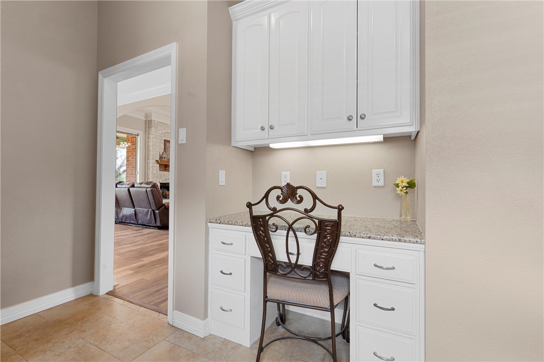 10513 T Bury Lane Waco, TX 76708 - Photo 18 of 36 a view of dining room with cabinet