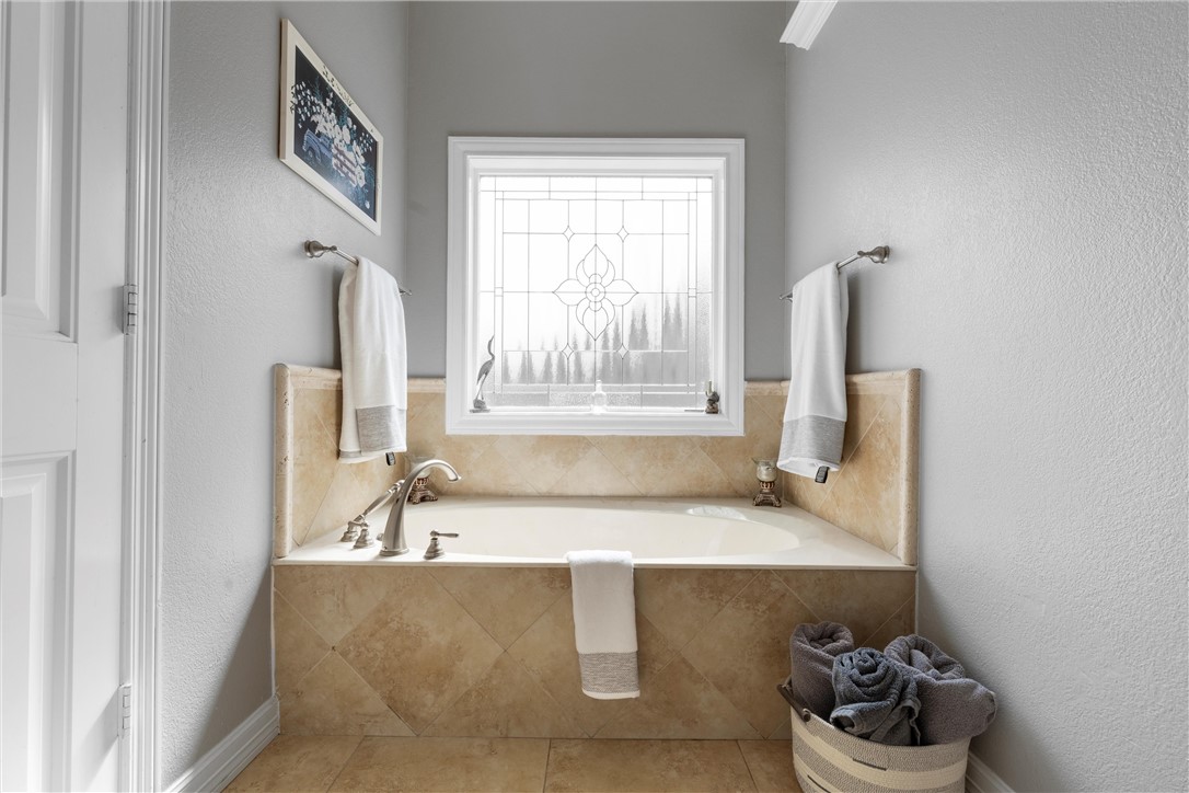 10513 T Bury Lane Waco, TX 76708 - Photo 30 of 36 a room with a sink and a window