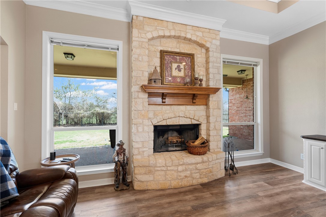 10513 T Bury Lane Waco, TX 76708 - Photo 8 of 36 a living room with furniture and a fireplace