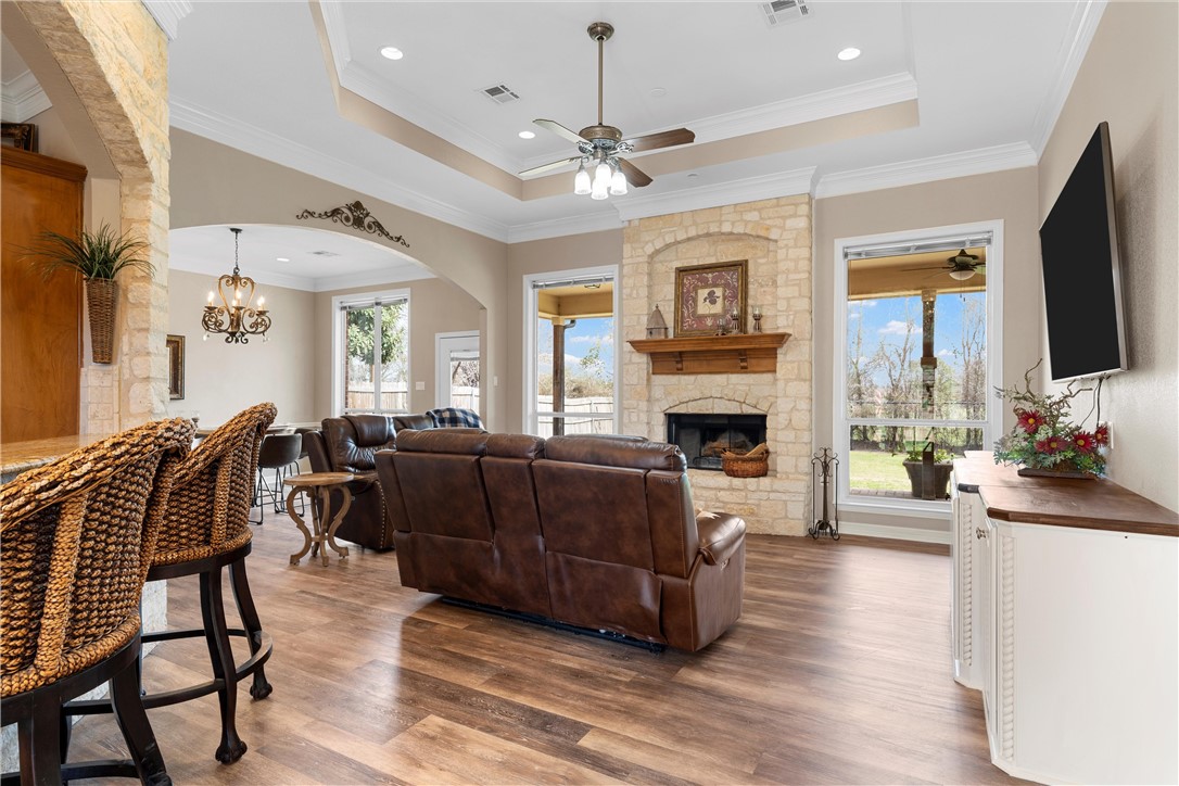 10513 T Bury Lane Waco, TX 76708 - Photo 10 of 36 a living room with furniture fireplace and flat screen tv