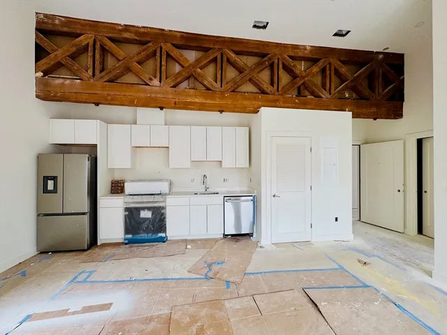a utility room with washer and dryer