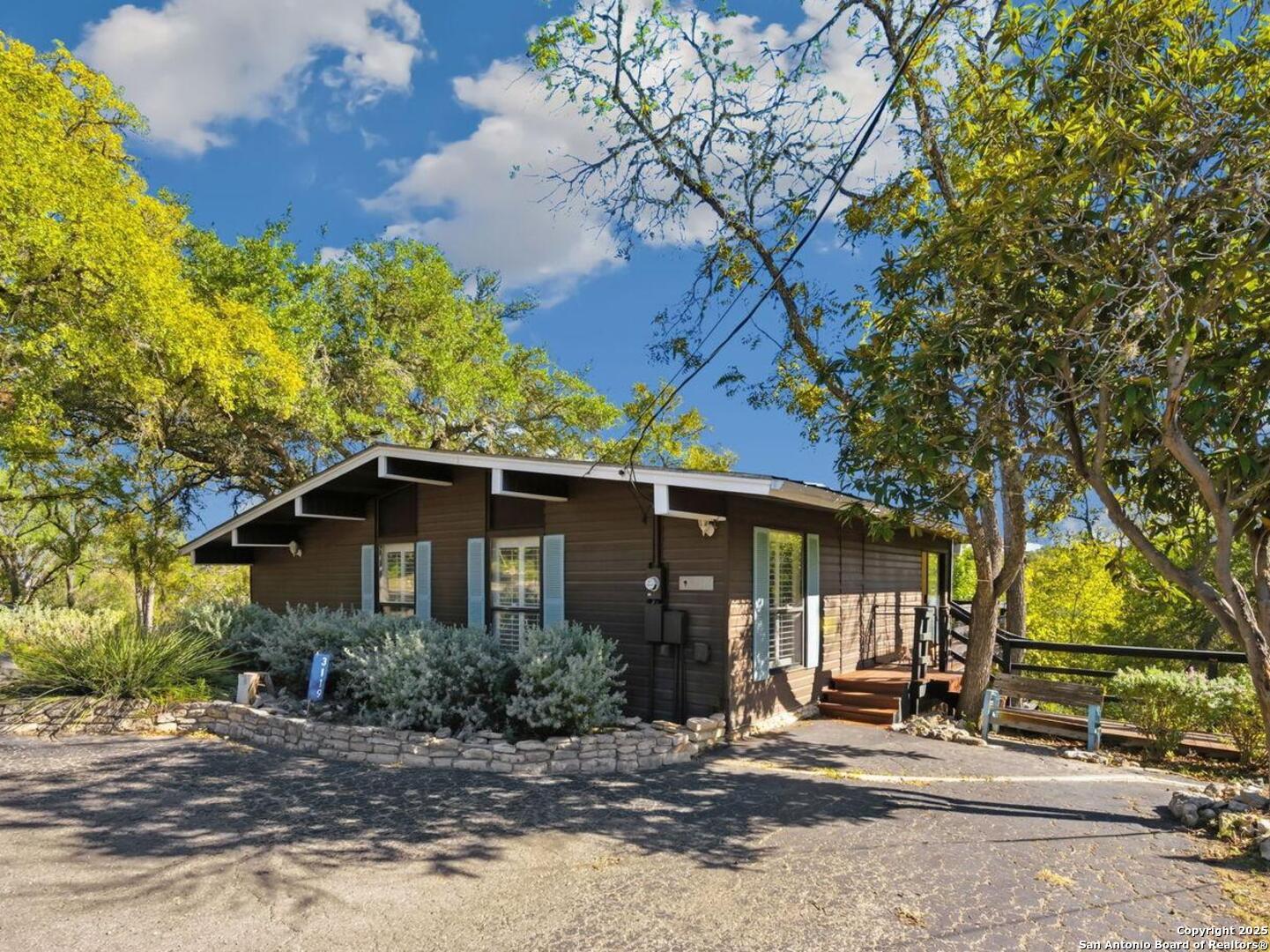 3119 Tanglewood Trail Spring Branch, TX 78070 - Photo 1 of 41 a view of a house with a tree in front