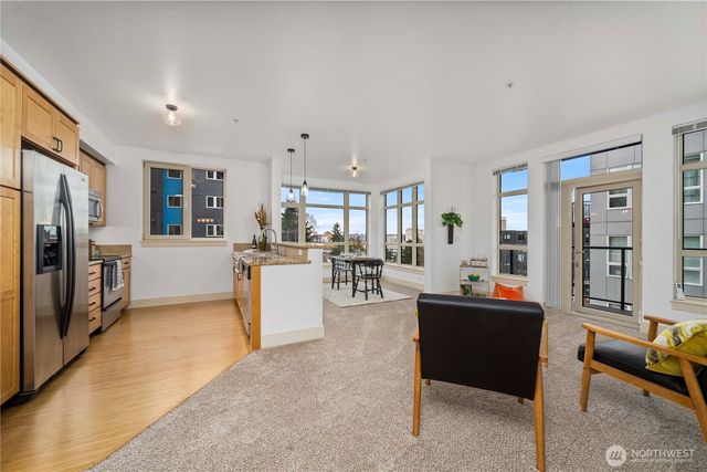 a room with furniture and air conditioner vent