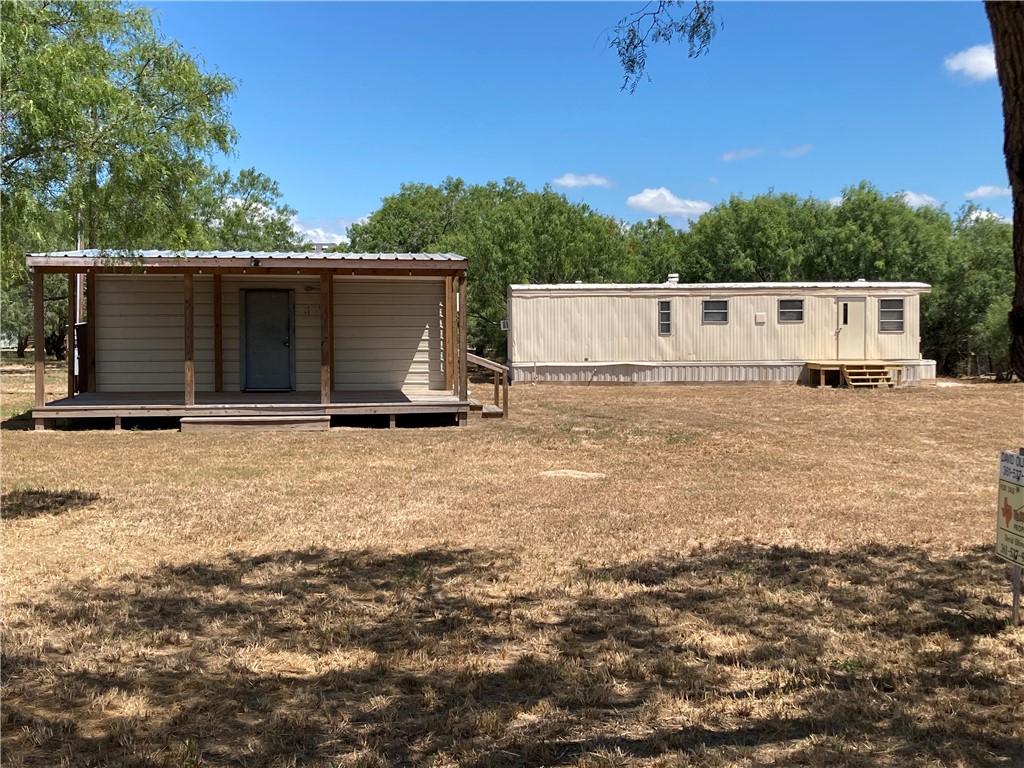 1134 East County Road 2328 Riviera, TX 78379 - Photo 1 of 27 a view of backyard with small cabin