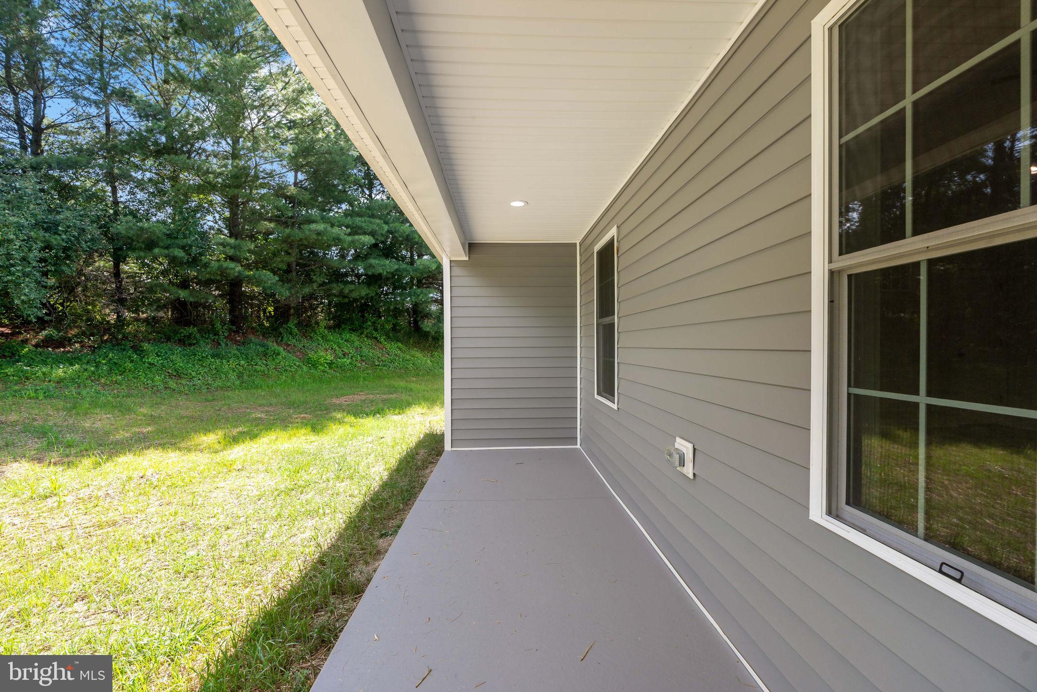 39 Mdg Berkeley Springs Berkeley Springs, WV 25411 - Photo 42 of 46 a view of balcony with garden
