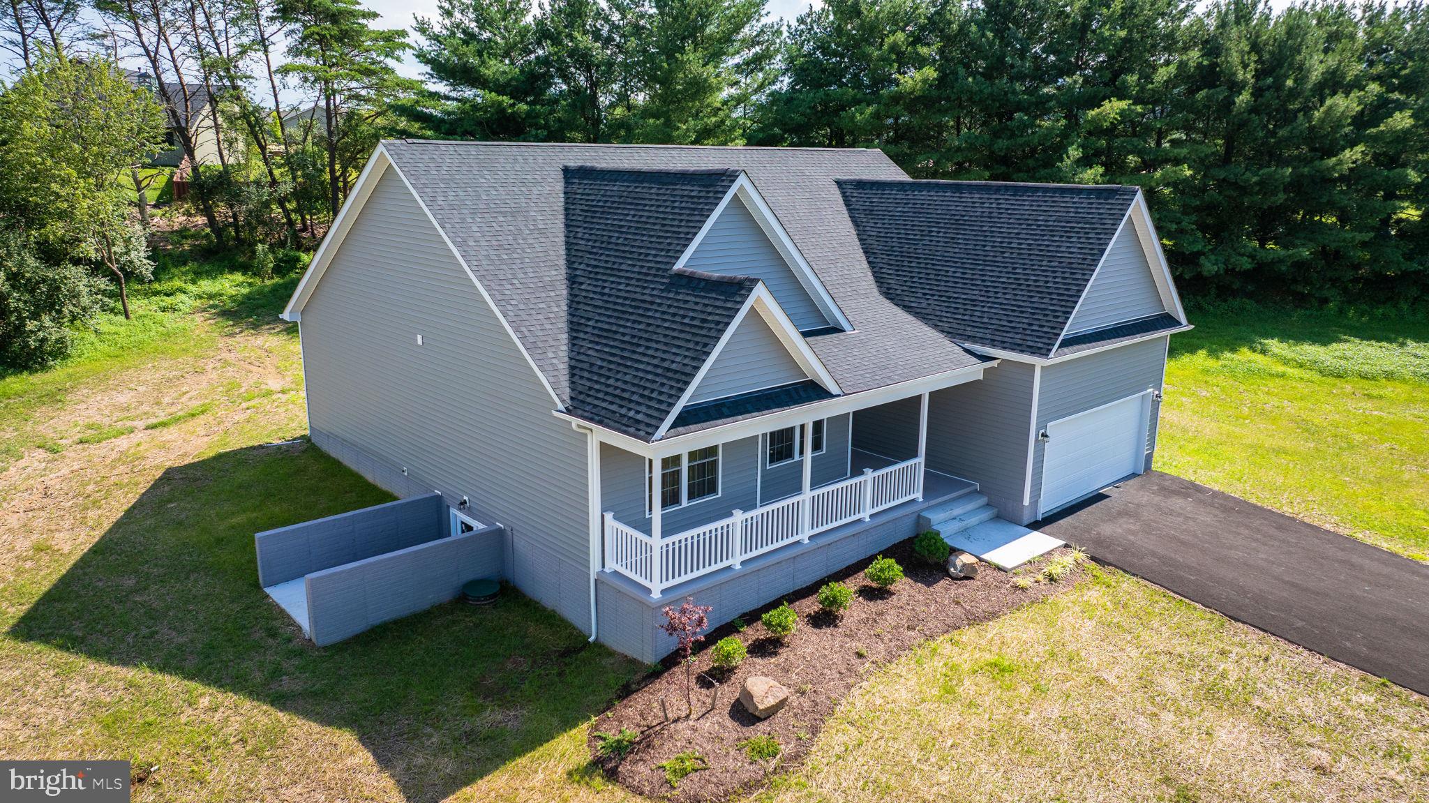 39 Mdg Berkeley Springs Berkeley Springs, WV 25411 - Photo 45 of 46 a view of a house with wooden deck front of house
