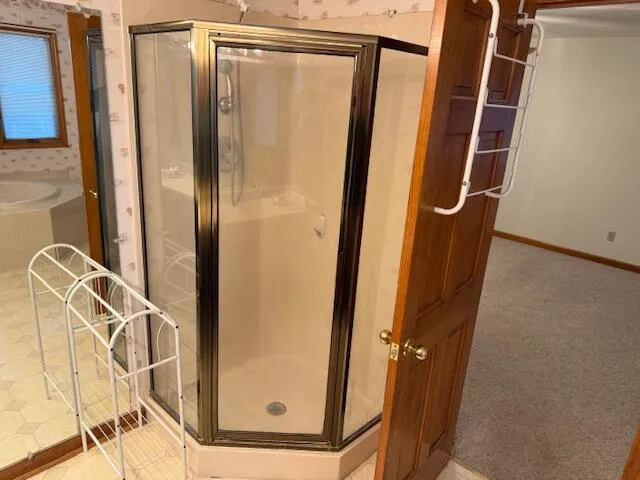 a bathroom with a sink vanity and a mirror