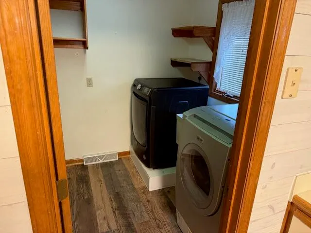 a view of backyard with wooden floor