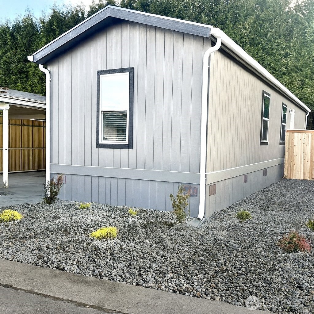 2322 Tacoma Road East, Unit 11 Puyallup, WA 98371 - Photo 13 of 15 a house with a outdoor space