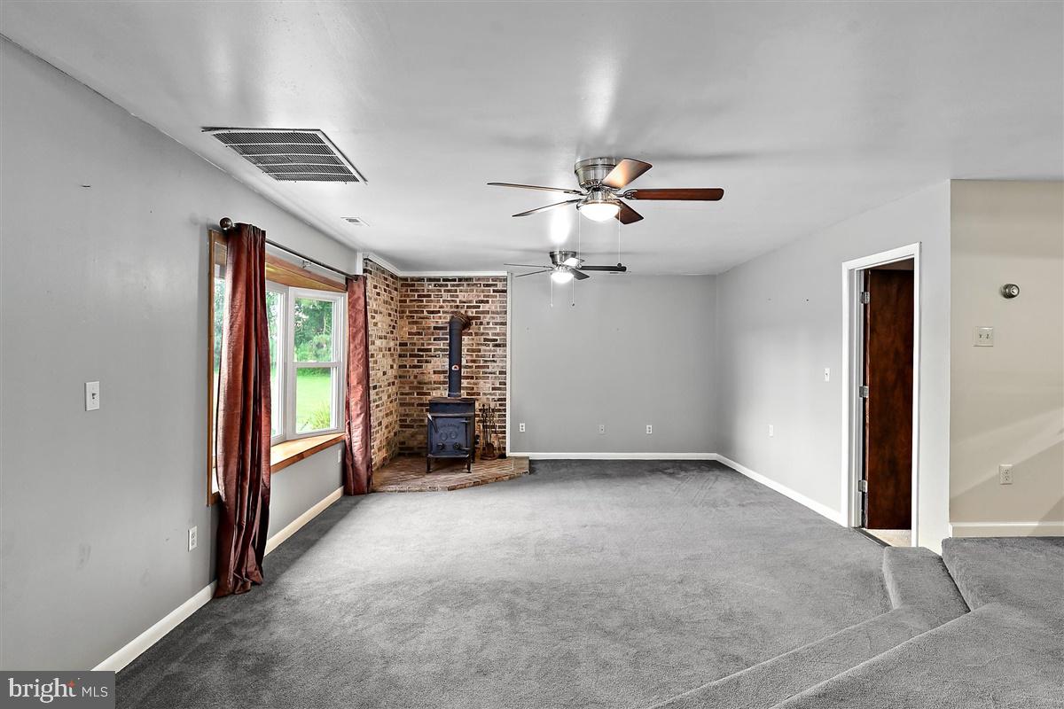 31388 Melson Road Delmar, MD 21875 - Photo 16 of 38 Living Room with Wood Stove
