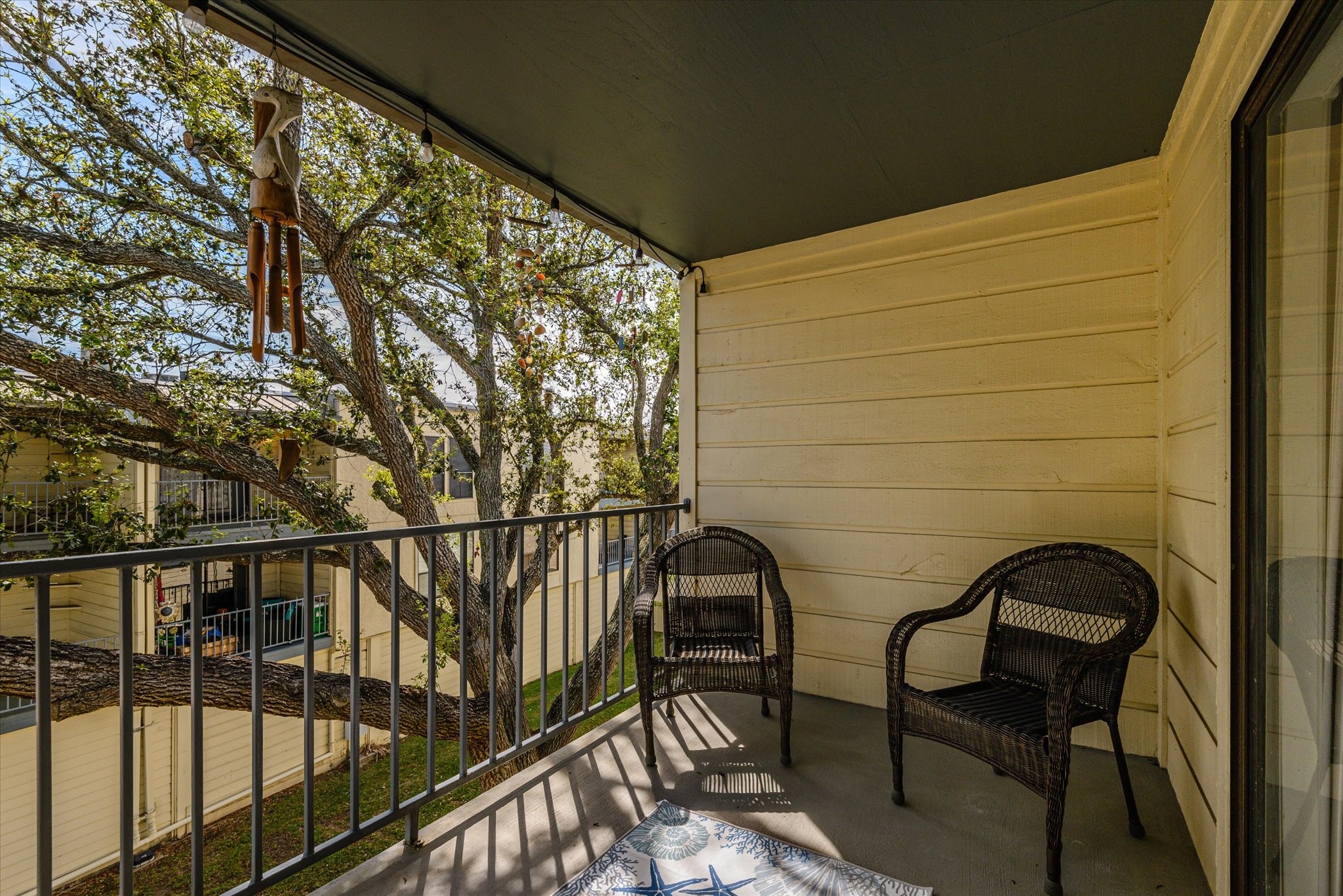 4001 East NASA Parkway, Unit 222 El Lago, TX 77586 - Photo 15 of 30 a view of a chairs and table in the balcony