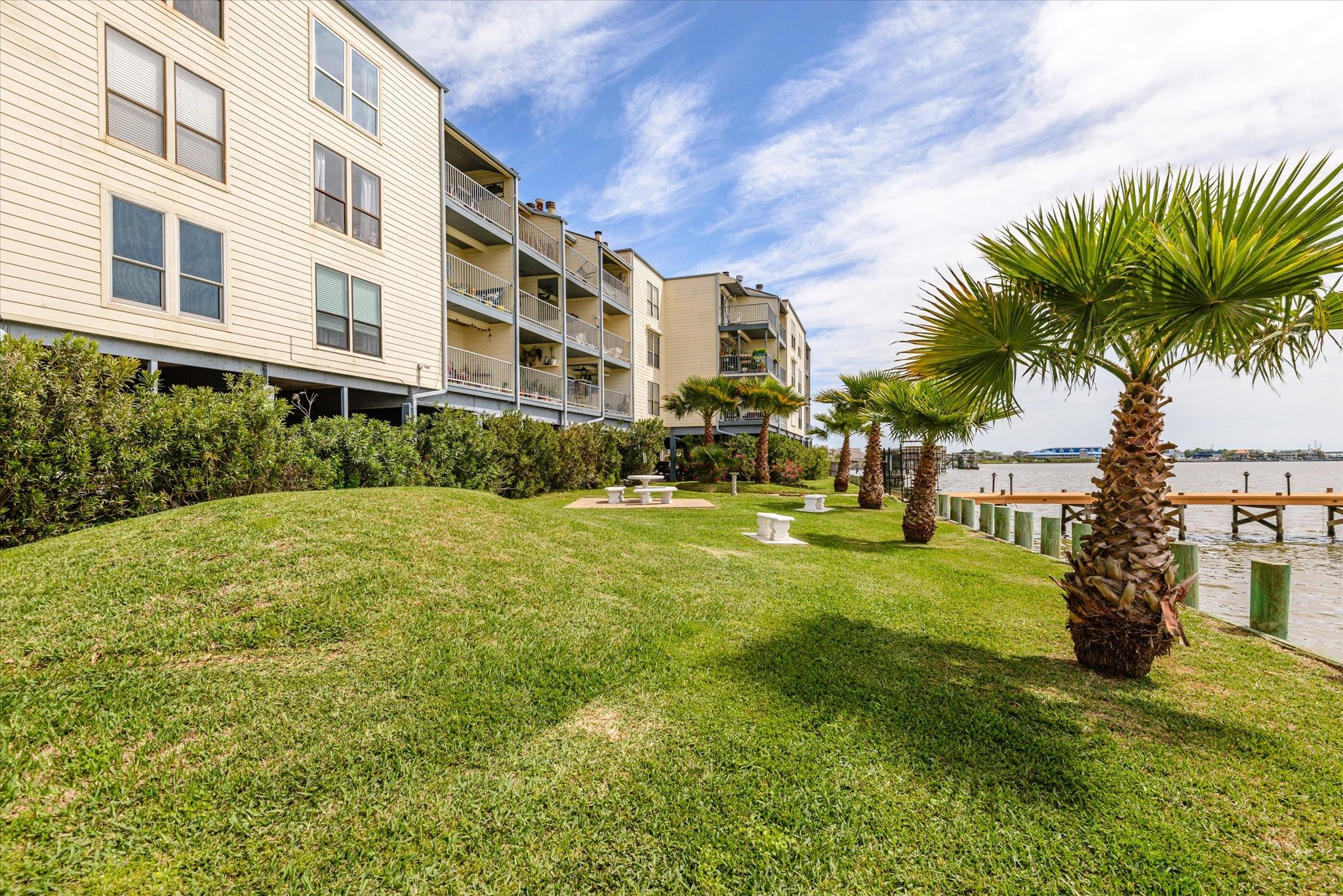 4001 East NASA Parkway, Unit 222 El Lago, TX 77586 - Photo 22 of 30 a view of a big yard with a large trees