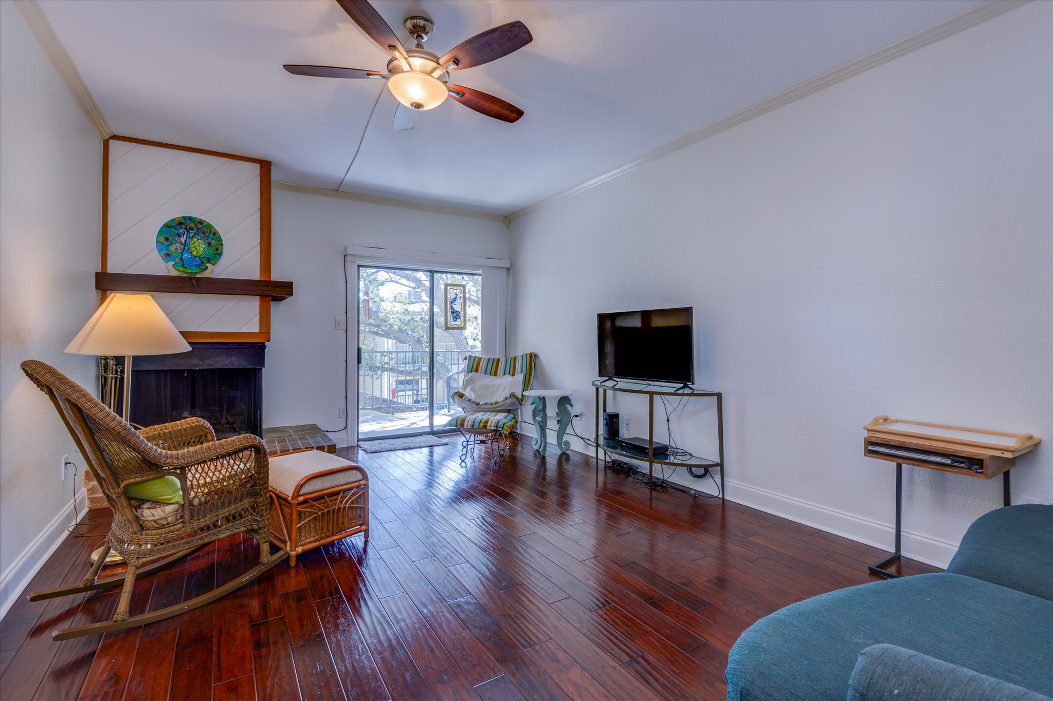 4001 East NASA Parkway, Unit 222 El Lago, TX 77586 - Photo 4 of 30 a living room with furniture and a flat screen tv