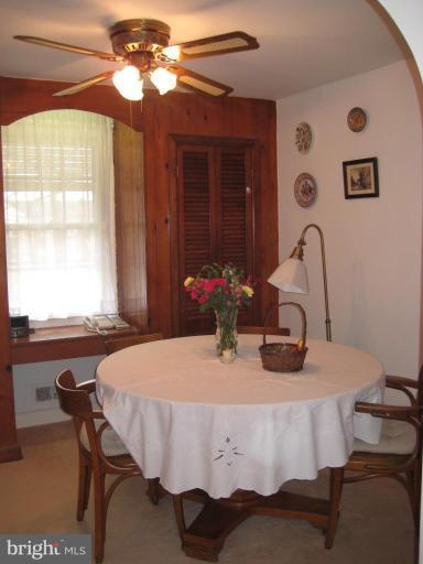 8120 Hillendale Road Parkville, MD 21234 - Photo 4 of 16 a dining room with table and chairs