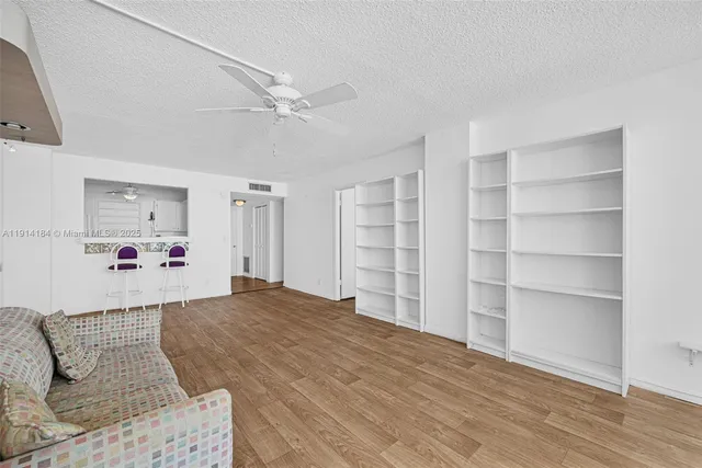 a bedroom with a bed and closet