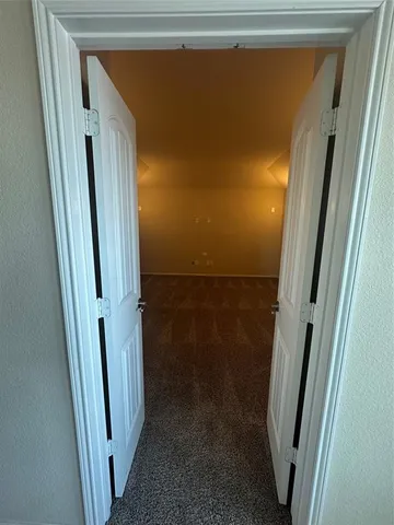 an empty room with a door
