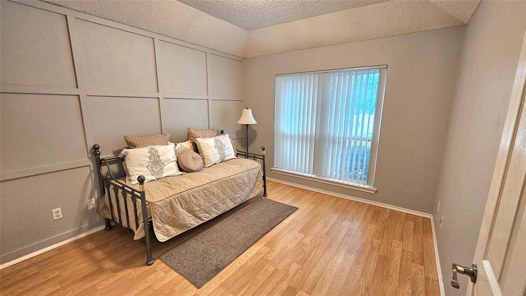 7529 Whitestone Ranch Road Benbrook, TX 76126 - Photo 18 of 26 a bedroom with a bed and a window