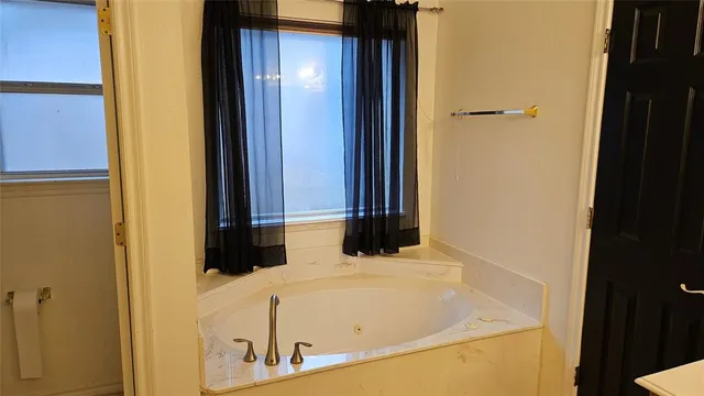 a bathroom with a bathtub