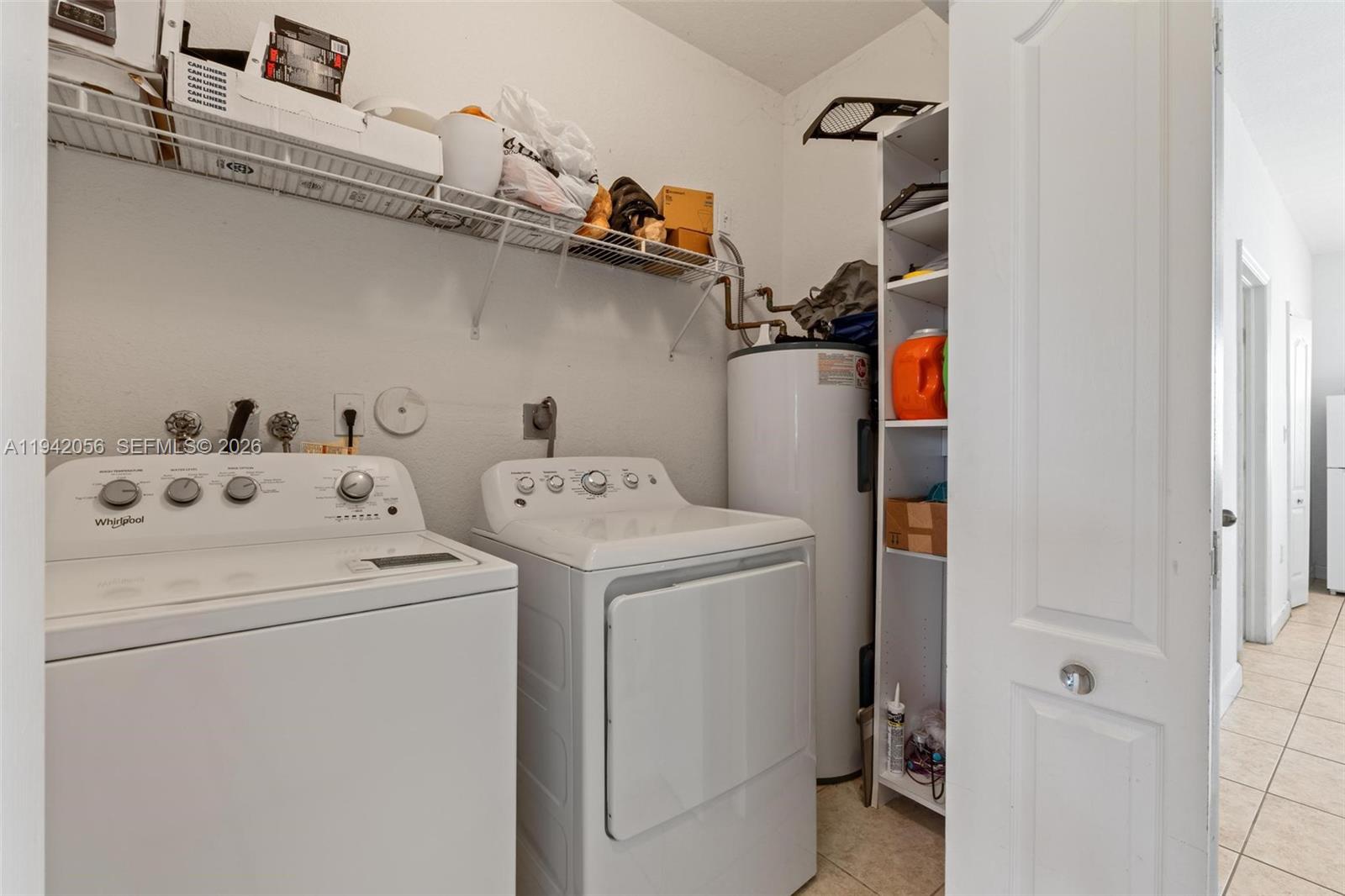 16301 Southwest 70th Street Miami, FL 33193 - Photo 23 of 56 a utility room with dryer and washer