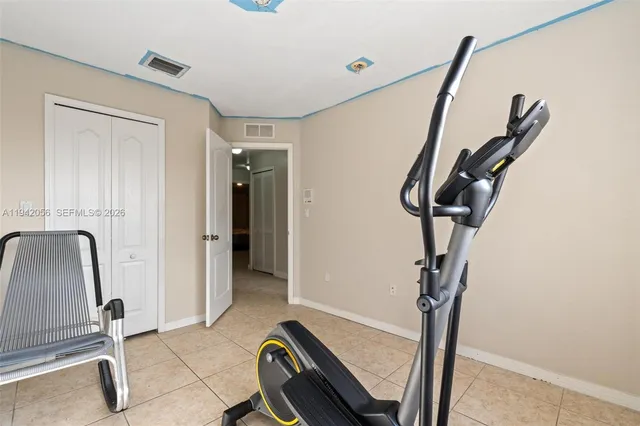 a workspace with furniture and wooden floor
