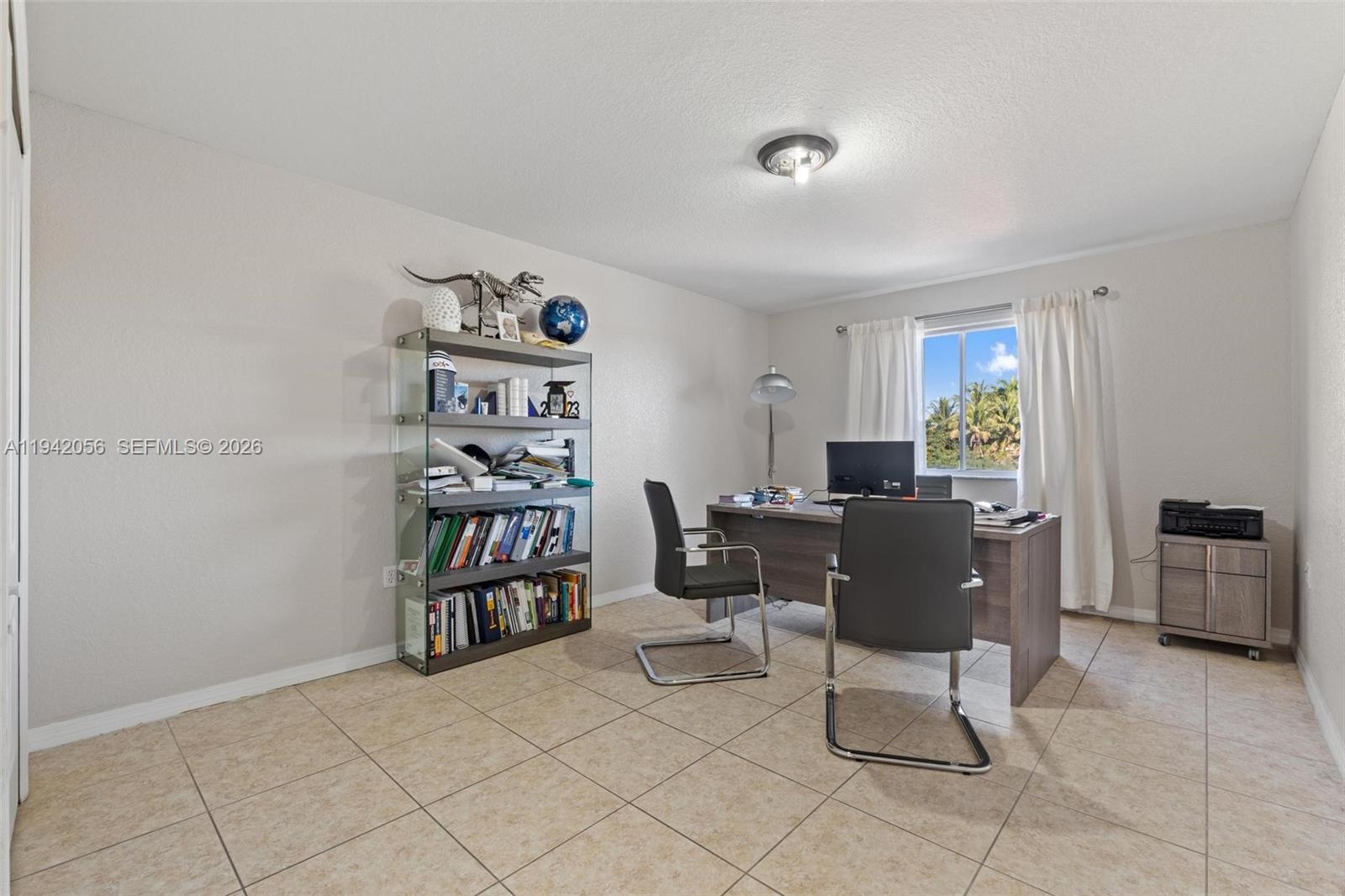 16301 Southwest 70th Street Miami, FL 33193 - Photo 40 of 56 a workspace with furniture