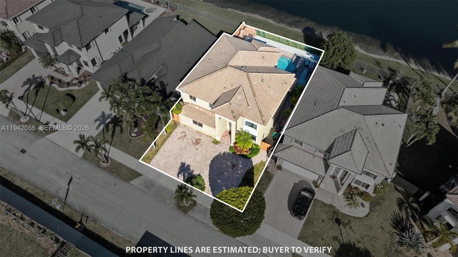 16301 Southwest 70th Street Miami, FL 33193 - Photo 48 of 56 an aerial view of a house with outdoor space