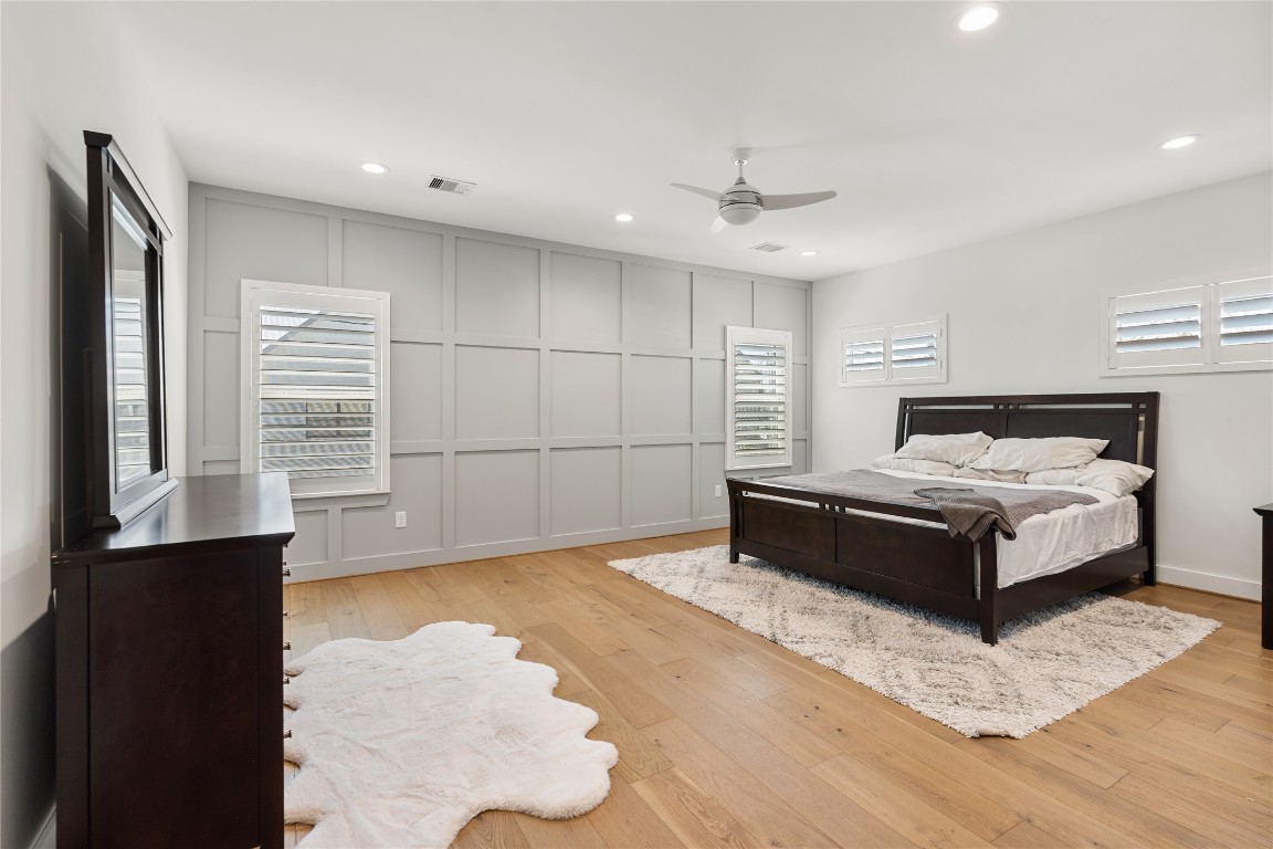 802 Aurora Street Houston, TX 77009 - Photo 11 of 23 a spacious bedroom with a bed and a window