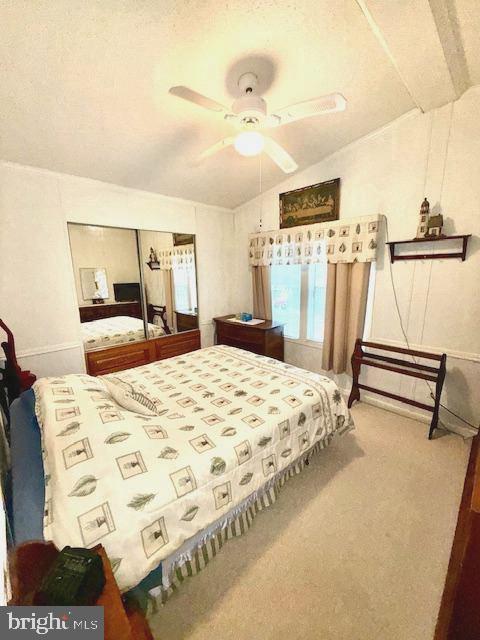 216 Timberline Circle Berlin, MD 21811 - Photo 16 of 31 a bedroom with a bed and wooden floor