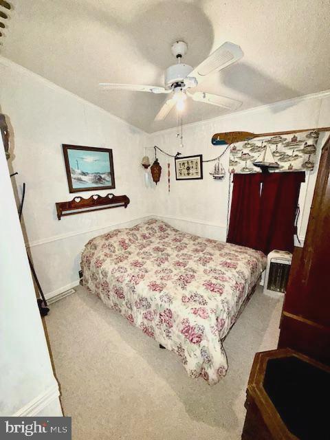 216 Timberline Circle Berlin, MD 21811 - Photo 19 of 31 a bedroom with a bed and a lamp on dresser
