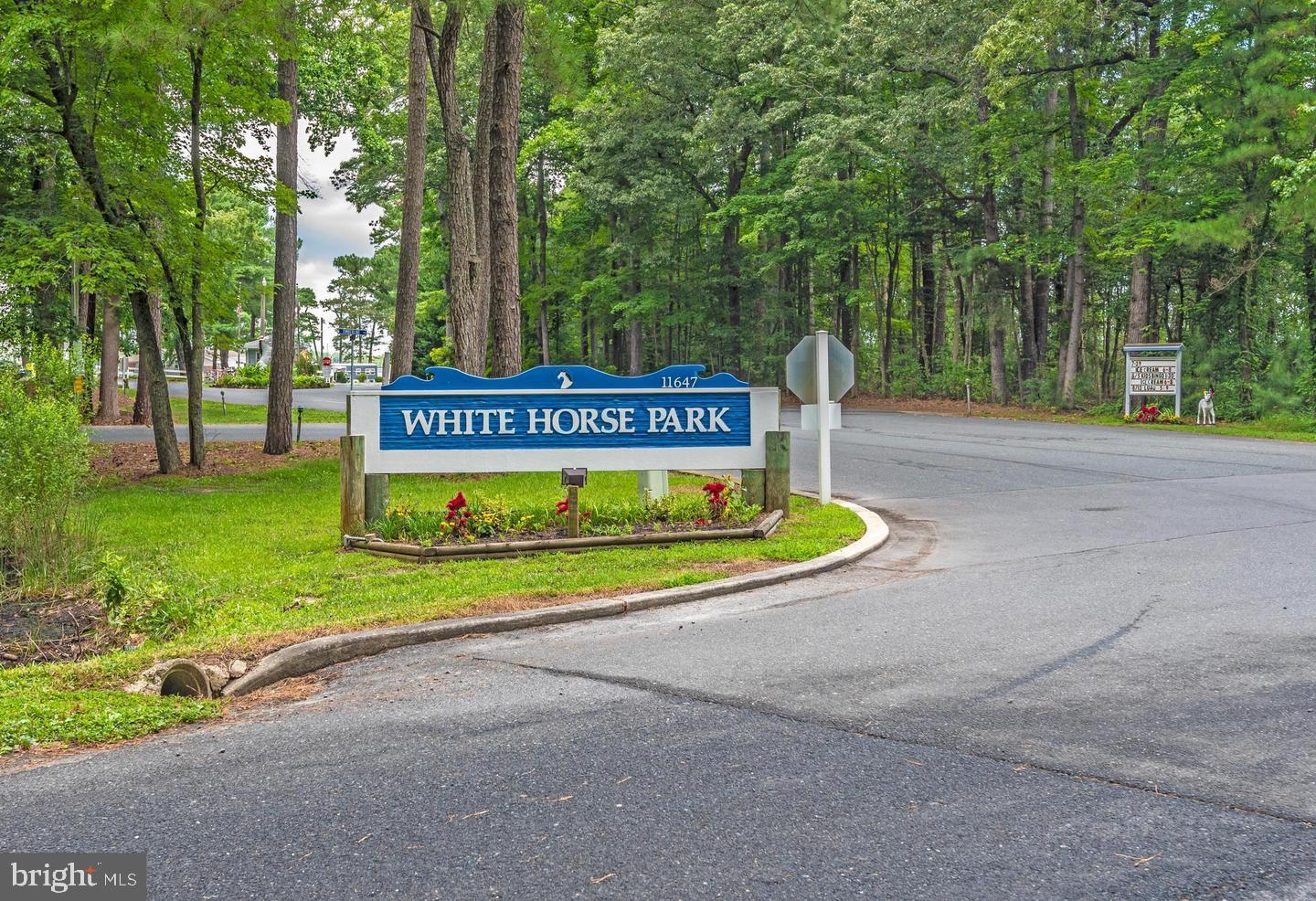 216 Timberline Circle Berlin, MD 21811 - Photo 3 of 31 a view of a park with bench and trees