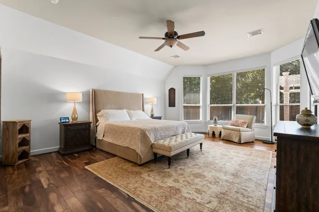 a bed room with a bed and a couch