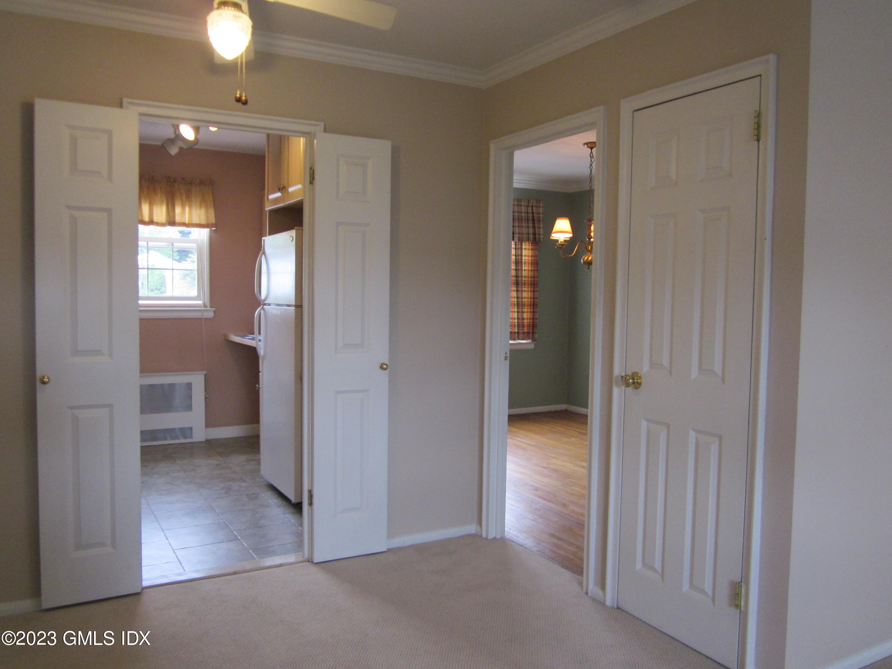 68 Putnam Park, Unit 68 Greenwich, CT 06830 - Photo 12 of 31 wooden floor in a room with closet and a bathroom
