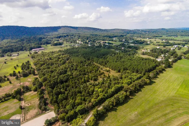 a view of a city with mountains in the background