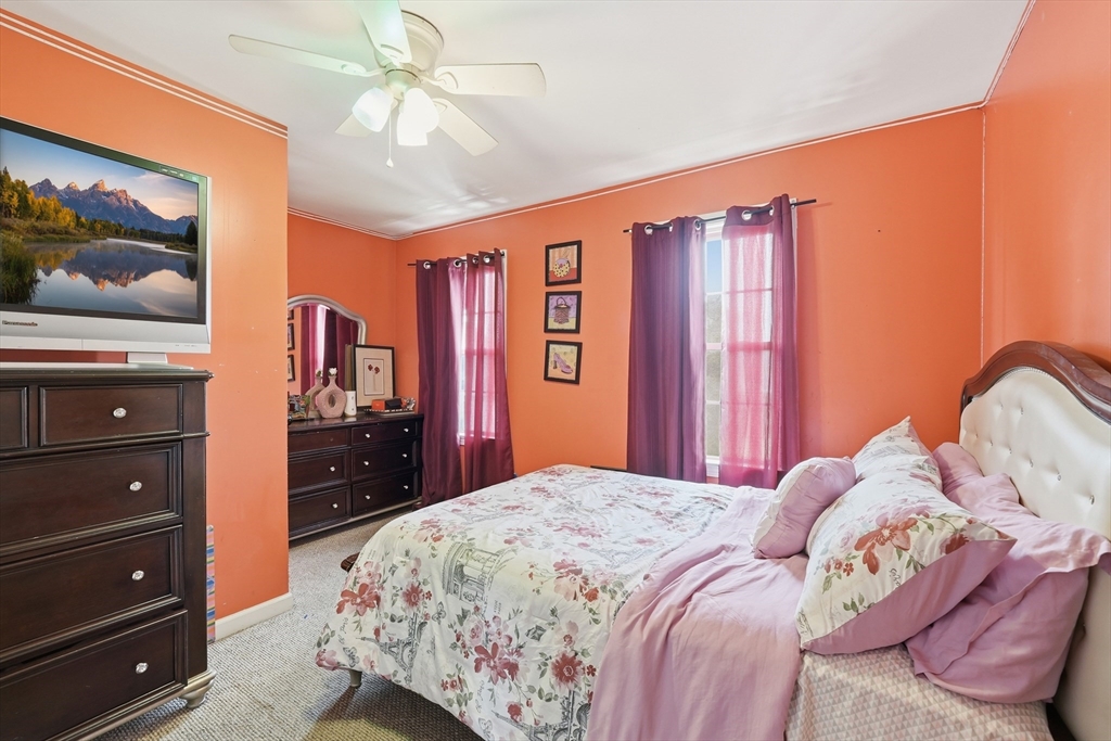 19 Annies Way Springfield, MA 01119 - Photo 24 of 40 a bedroom with a bed and a dresser