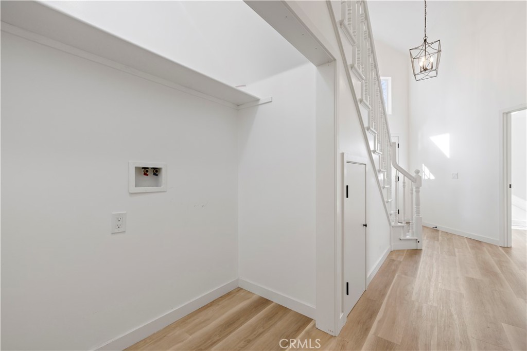 7049 Sunnycrest Trail Tujunga, CA 91042 - Photo 15 of 39 a view of a hallway with wooden floor