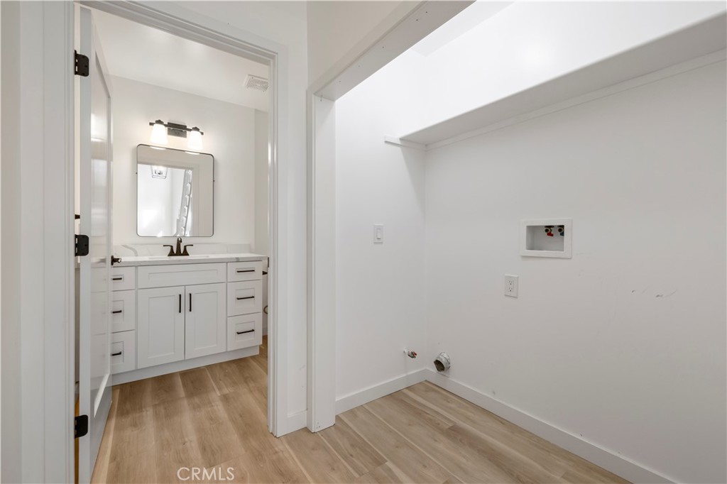7049 Sunnycrest Trail Tujunga, CA 91042 - Photo 16 of 39 a bathroom with a sink and a mirror