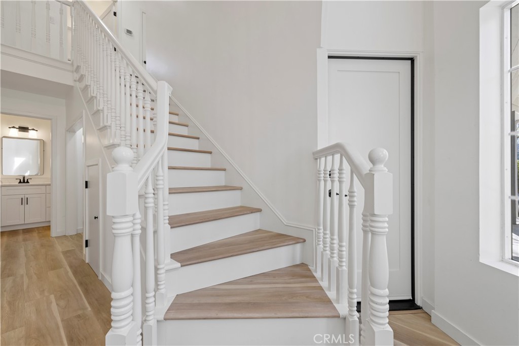 7049 Sunnycrest Trail Tujunga, CA 91042 - Photo 17 of 39 a view of entryway with wooden floor and a front door