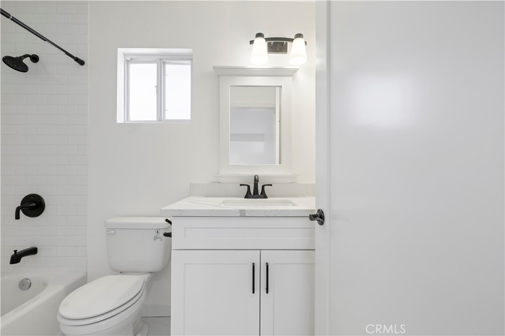 7049 Sunnycrest Trail Tujunga, CA 91042 - Photo 19 of 39 a bathroom with a sink a toilet and shower