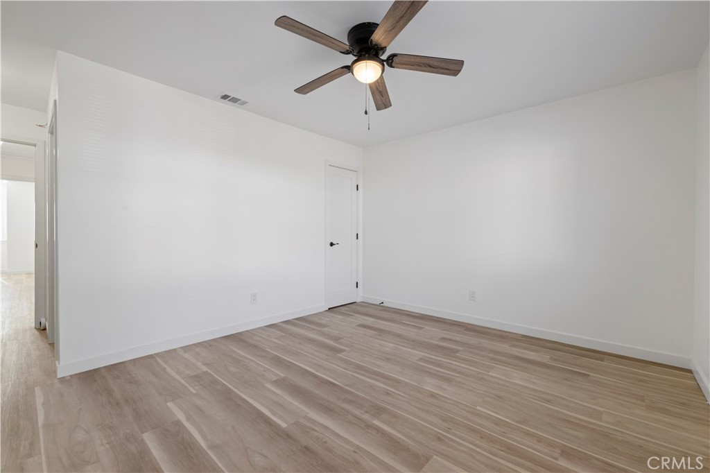 7049 Sunnycrest Trail Tujunga, CA 91042 - Photo 27 of 39 a view of an empty room with a ceiling fan