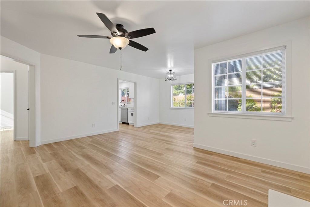 7049 Sunnycrest Trail Tujunga, CA 91042 - Photo 5 of 39 wooden floor in an empty room with a window