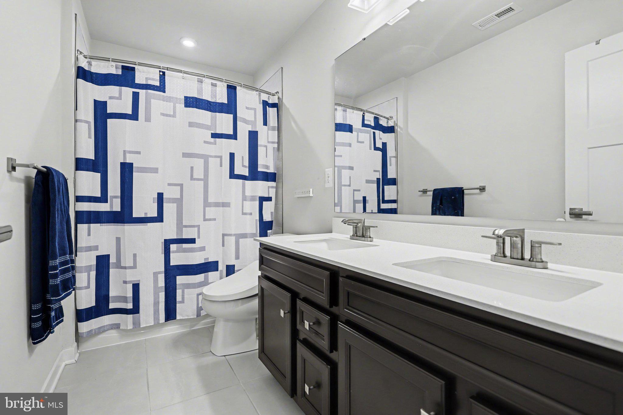 220 Kortney Drive Hanover, PA 17331 - Photo 26 of 41 a bathroom with a sink double vanity and a toilet