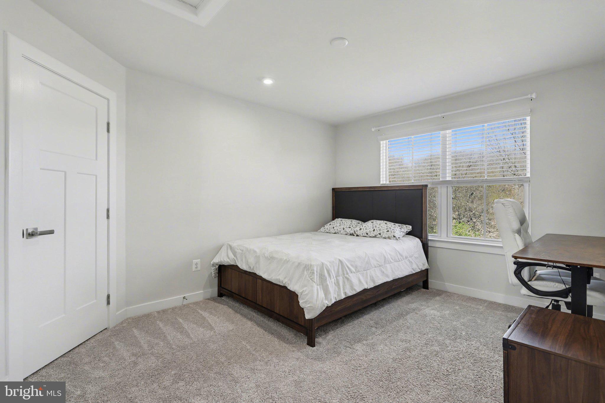 220 Kortney Drive Hanover, PA 17331 - Photo 28 of 41 a bedroom with a bed and a window
