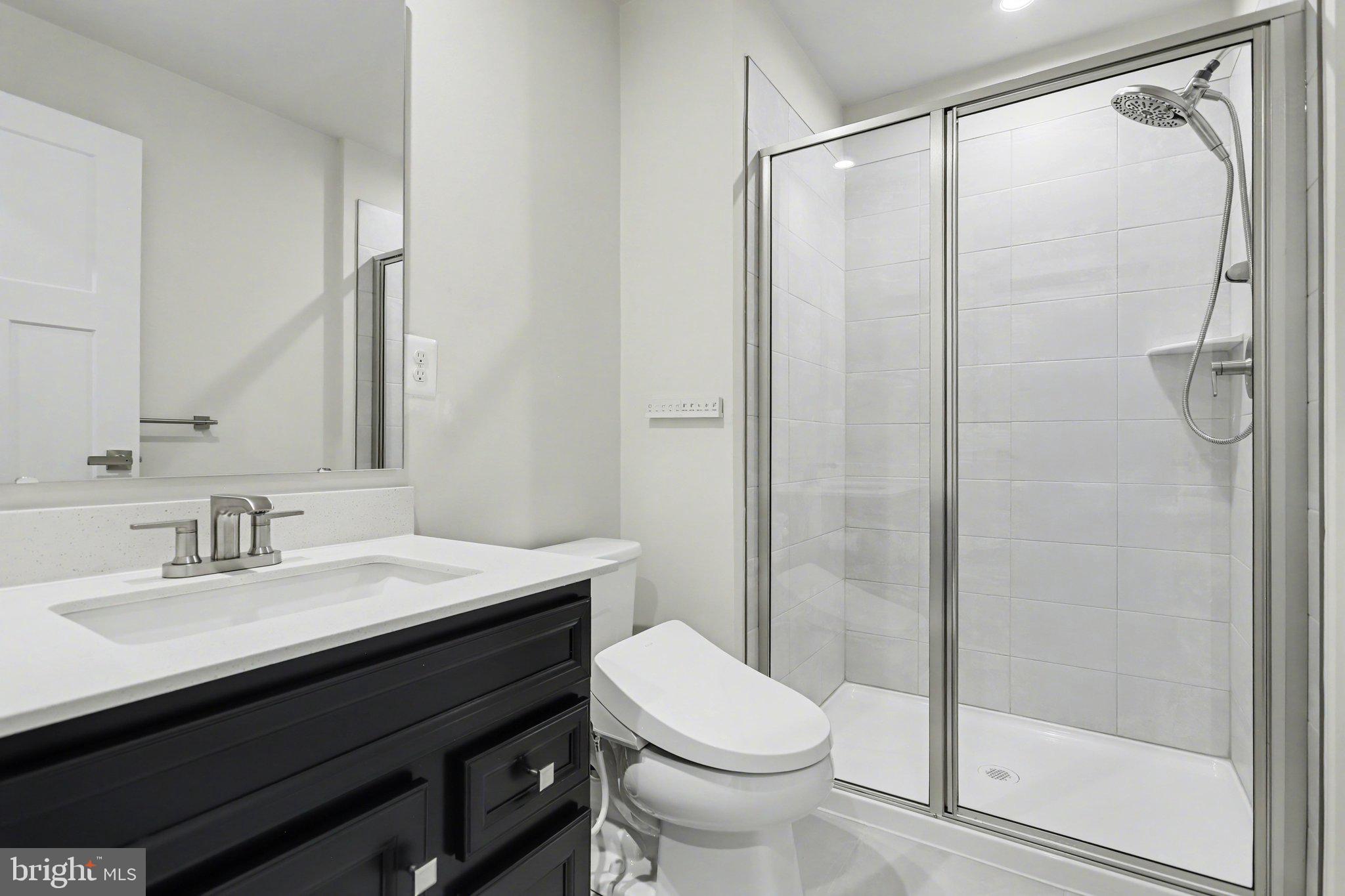 220 Kortney Drive Hanover, PA 17331 - Photo 33 of 41 a bathroom with a sink a toilet and shower